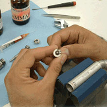 An Expert is repairing damaged Power Equipment Repair